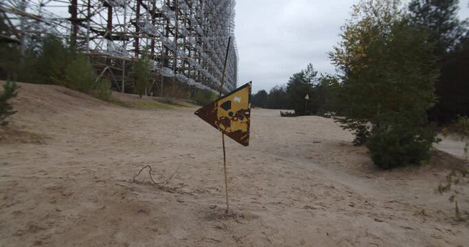 Rusty Radiation Warning Sign At The Duga Radar Station In Chernobyl, Pripyat, Ukraine - static shot
