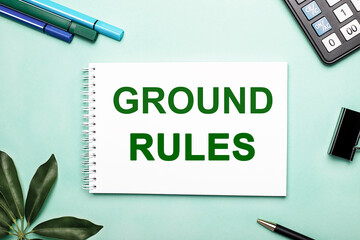 GROUND RULES is written on a white sheet on a blue background near the stationery and the sheffler sheet. Call to action. Motivational concept