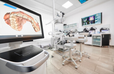 Snapshot of empty clean dental office. Interior of modern dental clinic. Computer screen with high...