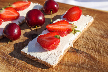 Fruit and berries on a cutting board proper food preparation home cooking foodphoto