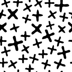 Seamless pattern. Crosses in a chaotic mess, hand drawn. 