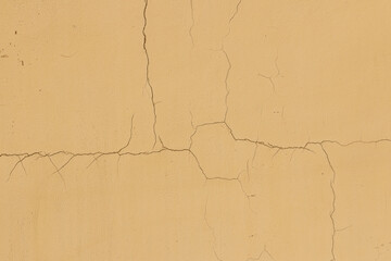 Abstract background of an old wall, plaster texture with cracks