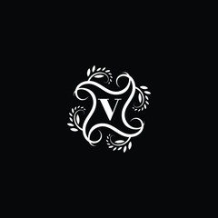 Initial Letter V Flourish circle monogram logo.