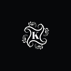 Initial Letter K Flourish circle monogram logo.
