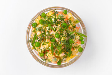 Healthy food - mix vegetable salad served in a bowl over white background. Healthy eating, delicious snack or dinner.
