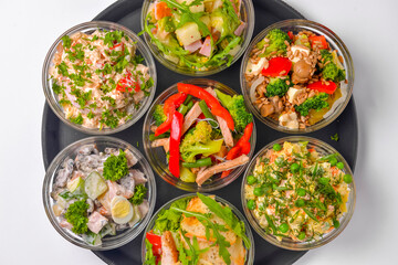 Healthy food - mix vegetable salad served in a bowl over white background. Healthy eating, delicious snack or sinner.