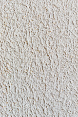 wall with white textured decorative plaster