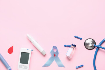 Glucometer with lancet pen, bottle of insulin, stethoscope and awareness ribbon on color...