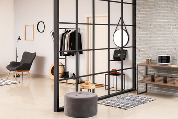Stylish interior of modern hall in studio apartment