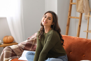 Obraz premium Beautiful young woman resting at home