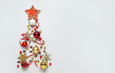 Fototapeta na wymiar Beautiful Christmas tree made of decor on white background