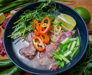 Vietnamese Fo-Bo soup with rice noodles and beef
