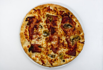 Italian Pizza with speck, mushrooms and provolone cheese