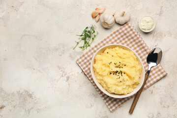 Fototapeta na wymiar Composition with tasty mashed potato and garlic on table
