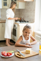 mom and child in the kitchen