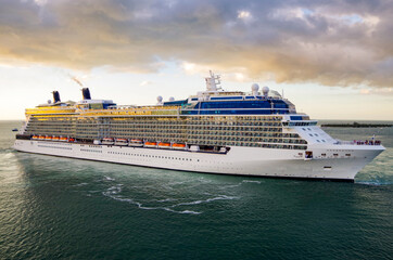 Celebrity cruiseship or cruise ship liner sail away departure from Key West, Florida during sunset...