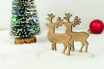 two christmas reindeer in the snow
