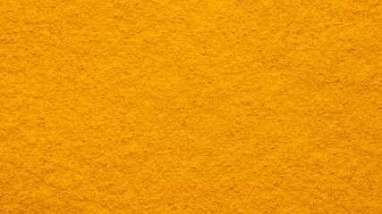Fototapeta premium turmeric powder top view. Condiment or dietary supplement