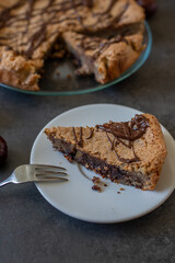 Delicious chestnut cake with almonds and chocolate glaze