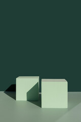 mint green product 3d cube podiums on a color block green and emerald background with graphic...