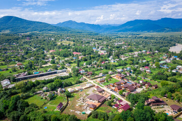 Fototapeta na wymiar Aerial view to the village of Dakhovskaya, Adygea, Russia