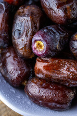 Ramadan Kareem.
Date fruit close-up.
Date fruit. Fresh young date close-up. The fruit is useful. Sweets for tea. Healthy nutrition concept