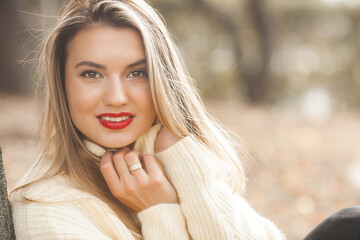 Classic woman portrait on autumn background