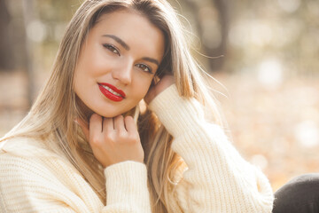 Naklejka premium Classic woman portrait on autumn background