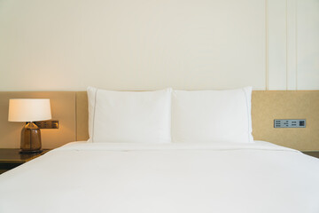 White pillow and blanket on bed decoration interior