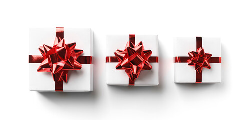 Merry Christmas card made of white gift boxes with red bows and ribbons on white background. Xmas and New Year holiday, bokeh, light. Flat lay, top view