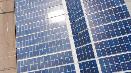 Obraz premium Aerial top view of the solar cells on the roof