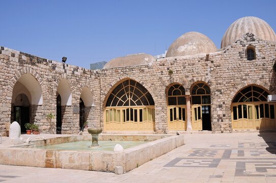 El Nuri Mosque is located on the banks of the Asi River. It is also known as Nureddin Zengi Mosque. The mosque was built in 1172. Hama, Syria. 