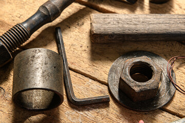 Old vintage household hand tools still life on a wooden background in a DIY and repair concept