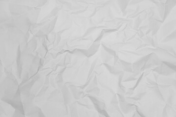 White crumpled paper texture background.