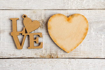 Wooden Heart and the text I love you on a white background. Vintage style.