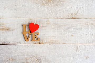 Red heart and the text I love you on a white background. Vintage style. Copy space.