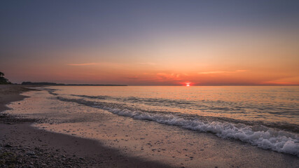 Colorful sunset above the sea, harmony and tranquility
