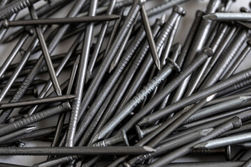 Extereme close up of a pile of metal nails