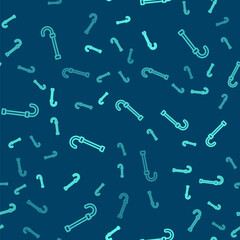 Green line Walking stick cane icon isolated seamless pattern on blue background. Vector.