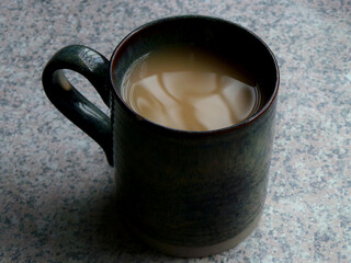 Mug of tea/coffee on a granite table