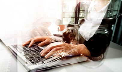 businesswoman hand using smart phone,mobile p payments online shopping,omni channel,digital tablet docking keyboard computer at office in sun light