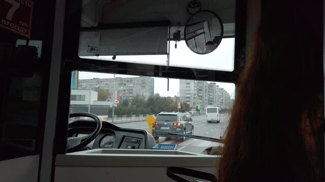 View on a bus driver cabin riding bus. Traveling by bus. Using public transport