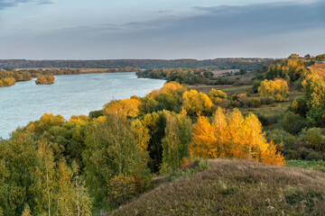 Oka river under blue sky on sunny autumn day.