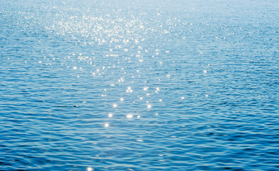 Lights on sea background. Waves.