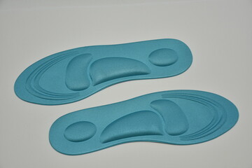 Blue Memory Foam  Shoe Insoles on a white background