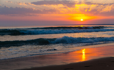 Sunset over the sea and beautiful cloudscape