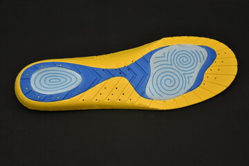 New orthopedic  Shoe Insoles on black  background