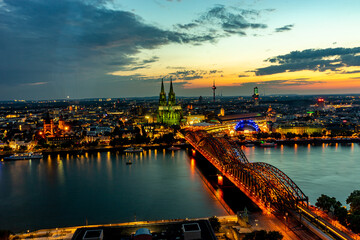 Germany, Cologne, a large body of water with a city in the background