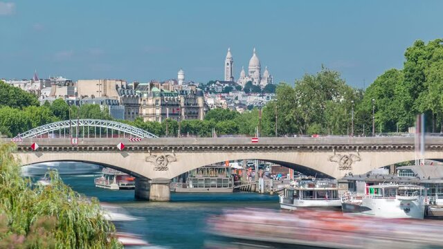 Bridge Jena and Basilica du Sacre-Coeur timelapse. Paris, France. It connects the Champ de Mars and the Trocadero gardens. It is named after the town of Jena, where Napoleon defeated the Prussian