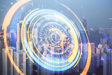 Double exposure of technology theme hologram and cityscape background. Concept of Hightech.